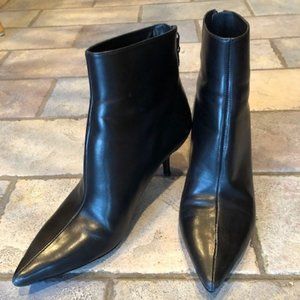 Black leather booties with kitten heels